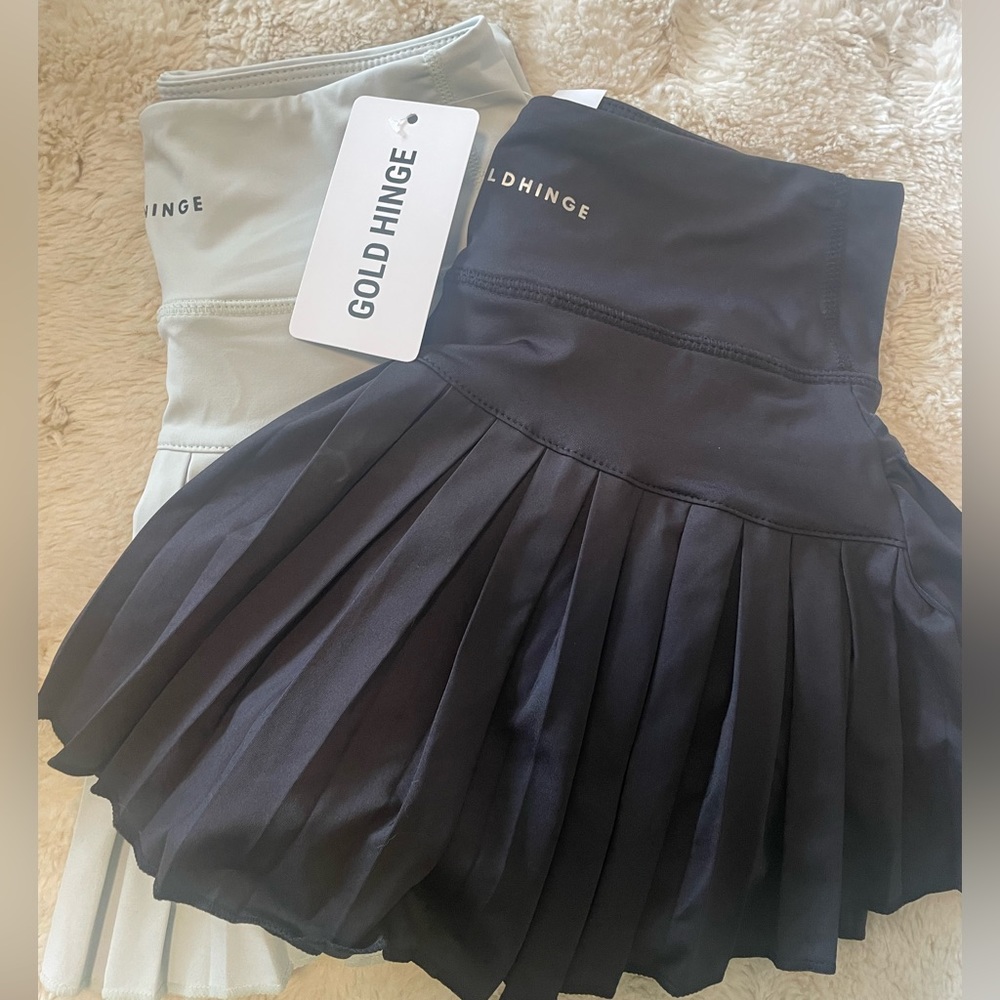 2 Gold Hinge Pleated Skirts